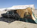 Home on the playa (side, tent bent in the wind)